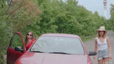 Alice Fabre, Cathy Heaven in Girlfriends Alice Fabre and Cathy Heaven love having a little bit of naughty fun, even when they are having car trouble
