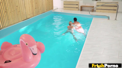 Poolside passion for blonde beauty